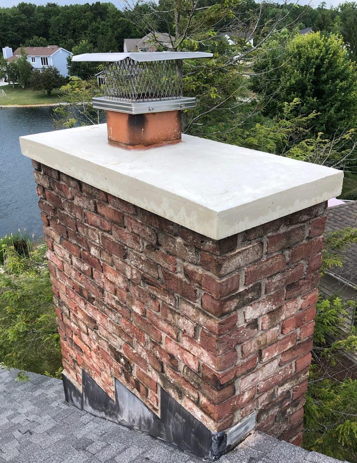 The same chimney with a new cast crown